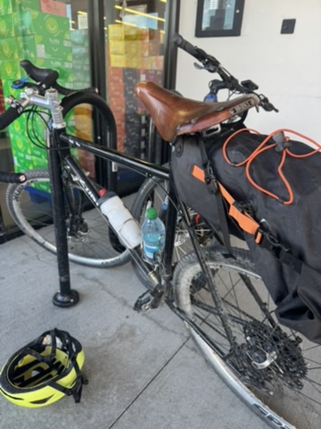 My bike in 'Grocery-getter' mode, appropriately parked outside the grocery store with a full Ortlieb seat bag.